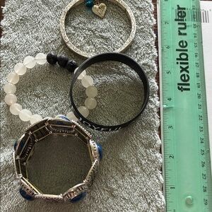 Set of Four Bracelets with Blue and White Accents